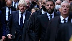 Le Premier ministre britannique Boris Johnson et les députés en route vers l'Église Sainte-Marguerite de Westminster (18/10/21)