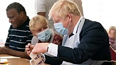 Britain's Prime Minister Boris Johnson during a visit to Westport Care Home in east London on September 7, 2021. 