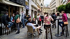 People sitting outside a cafe in Bratislava, Slovakia