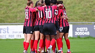 Lewes FC Women celebrate scoring against Charlton Athletic Women