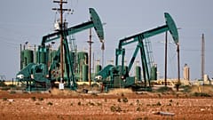 In this Wednesday, July 29, 2020 file photo, a view of a pump jack operateing in an oil field in Midland, Texas. 