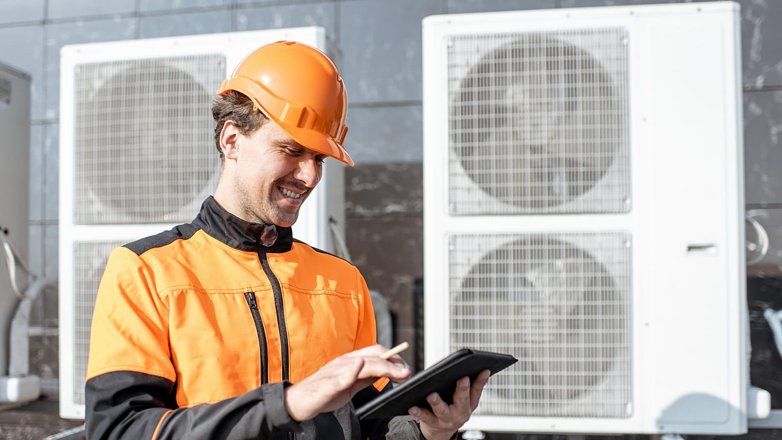 Heat pumps are installed outside a property