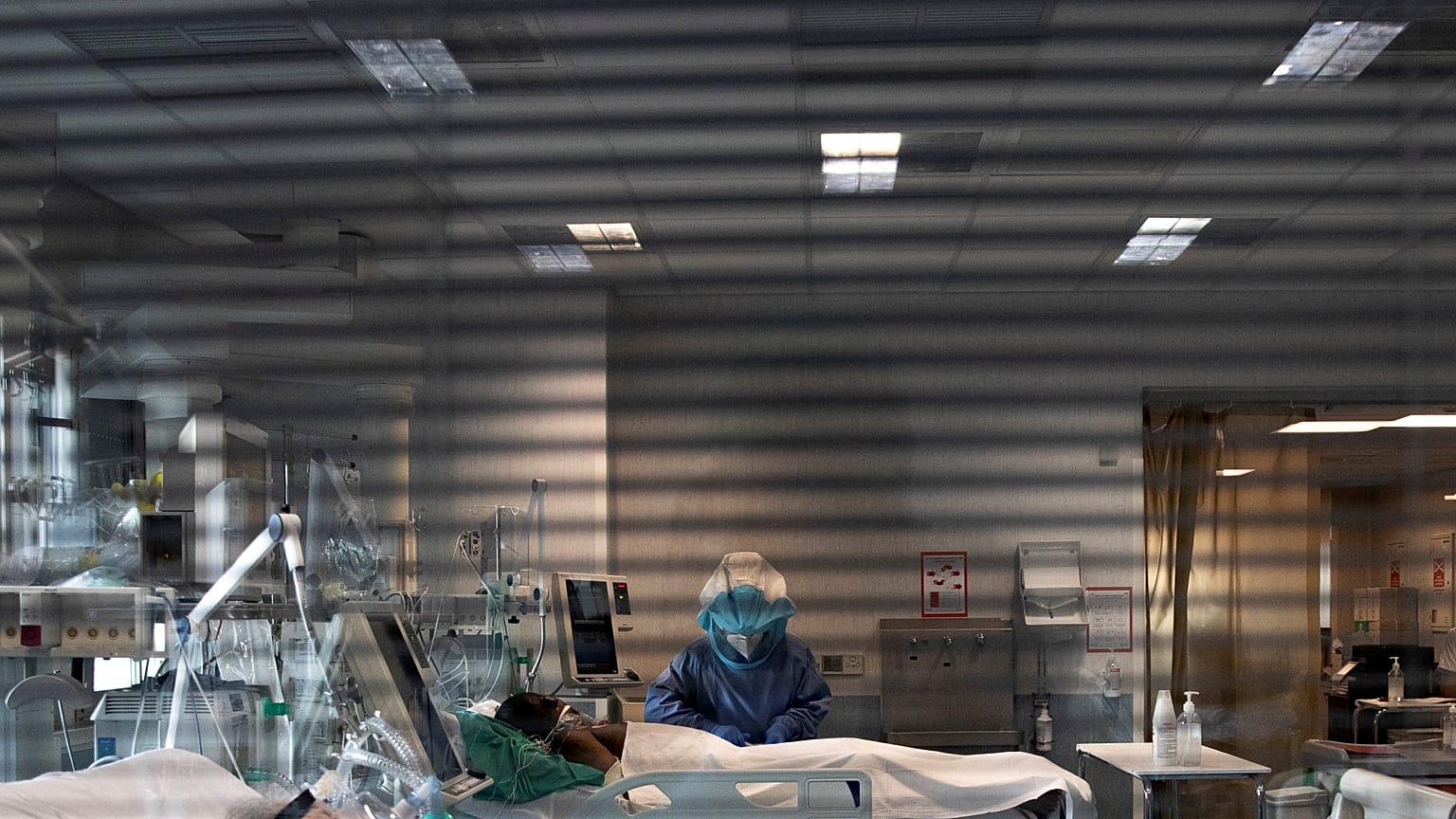 A nurse tends to a COVID-19 patient at the Tor Vergata Polyclinic Hospital