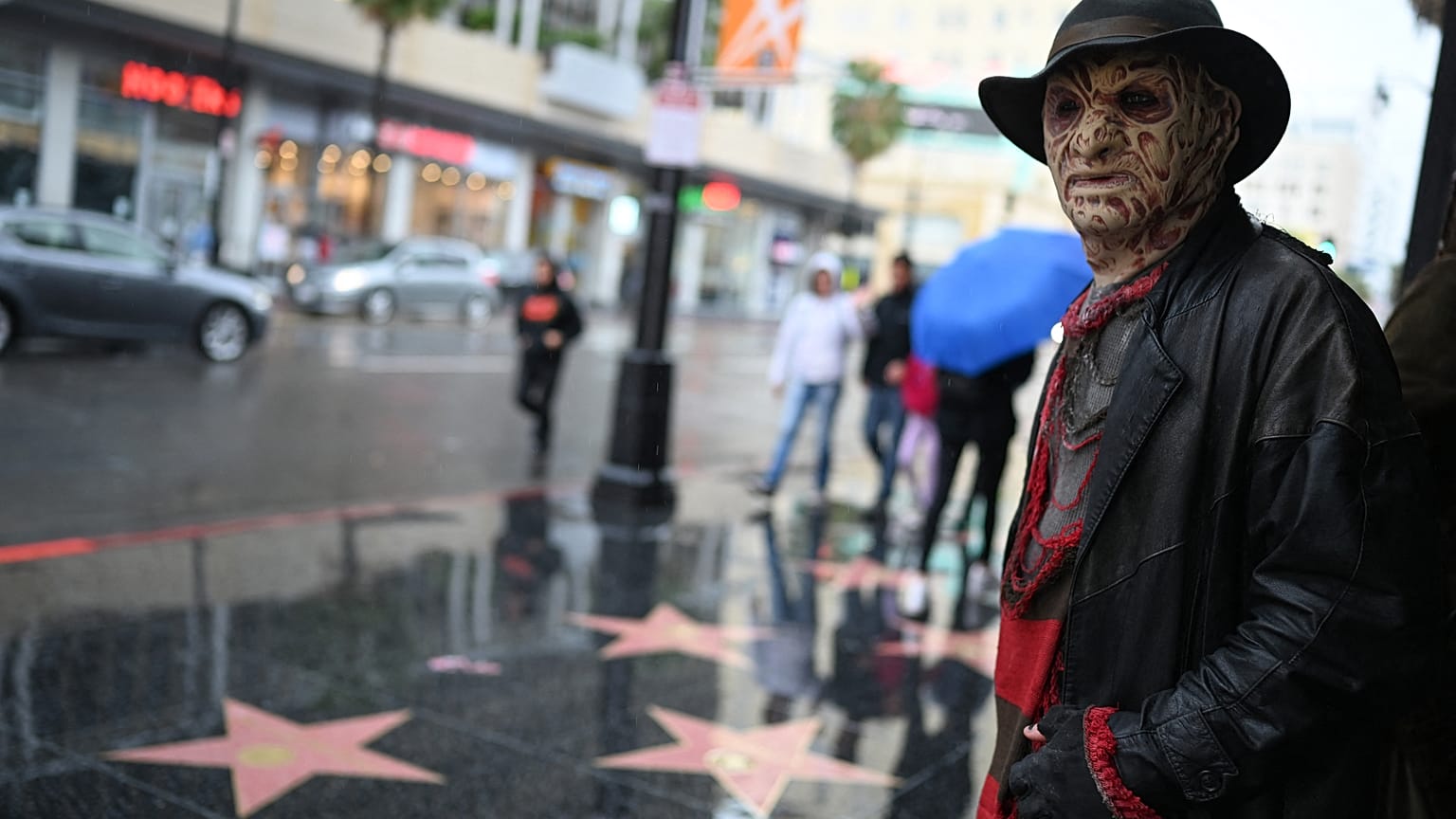 A Freddy Krueger impersonator on the Hollywood Walk Of Fame, situated near the real house