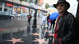 A Freddy Krueger impersonator on the Hollywood Walk Of Fame, situated near the real house
