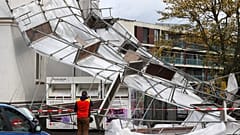 A collapsed scaffold lies in front of a house in Würzburg, Germany.