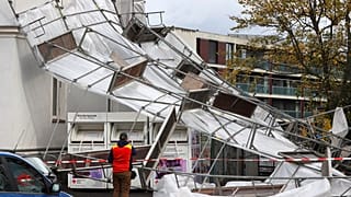 A collapsed scaffold lies in front of a house in Würzburg, Germany.