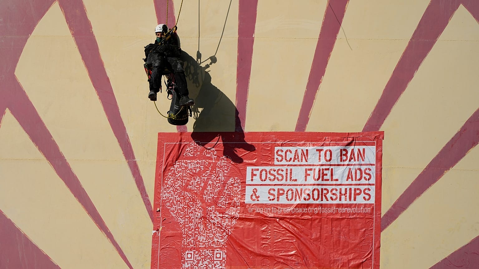 Greenpeace climate activists stage a protest at a Shell refinery in Rotterdam, Netherlands