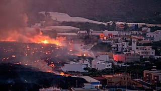 Lava flows from a volcano destroying houses at La Laguna neighbourhood on the Canary island of La Palma, Spain on Thursday Oct. 21, 2021.