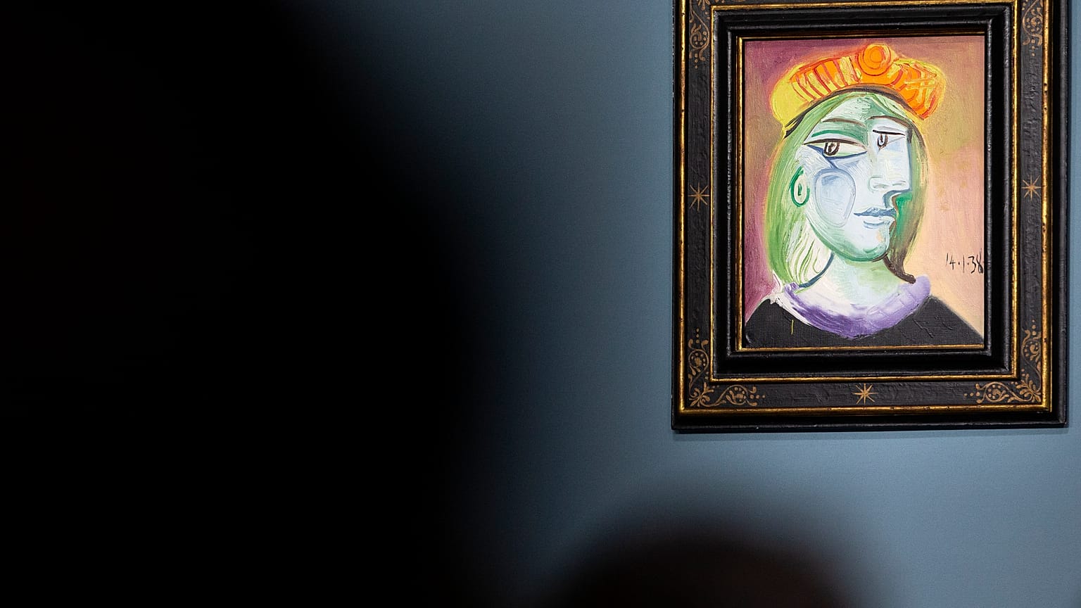 Pablo Picasso's "Femme au béret rouge-orange" is on display for auction at the Bellagio hotel and casino Saturday, Oct. 23, 2021, in Las Vegas. 