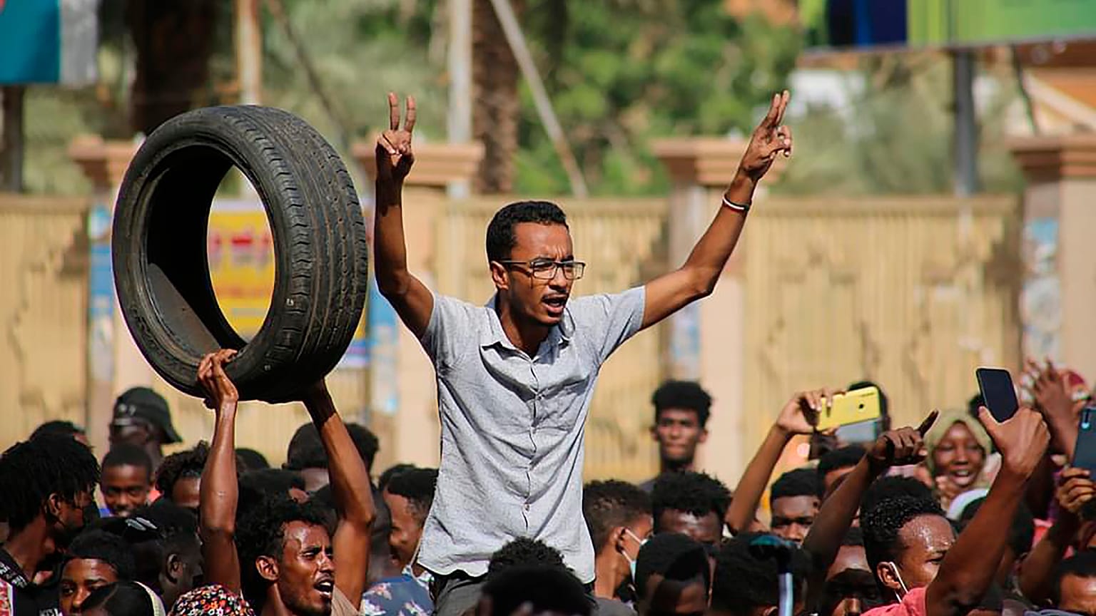 Thousands of pro-democracy protesters take to the streets to condemn a takeover by military officials in Khartoum, Sudan, Monday Oct. 25, 2021.