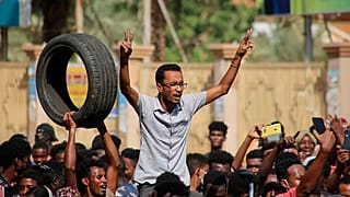 Thousands of pro-democracy protesters take to the streets to condemn a takeover by military officials in Khartoum, Sudan, Monday Oct. 25, 2021.