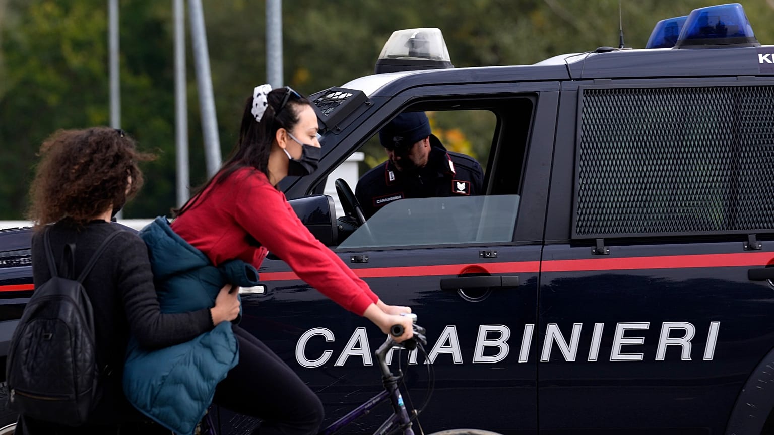 Italian carabinieri officers between the southern, ethnic Albanian-dominated and the northern, Serb-dominated part of Mitrovica, Kosovo, Oct. 17, 2021.