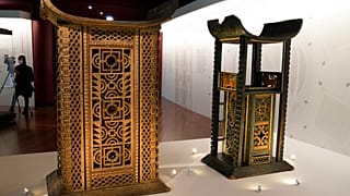 The 19th century Throne of King Ghezo, left, and Throne of King Glele, from Benin, are pictured at the Quai Branly–Jacques Chirac museum, Monday, Oct. 25, 2021 in Paris. 