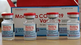 In this Sunday, Aug. 15, 2021 file photo, vials of the Moderna COVID-19 vaccine are seen at the Assad Iben El Fourat school in Oued Ellil, outside Tunis. 