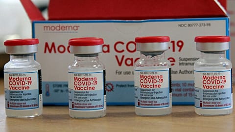 In this Sunday, Aug. 15, 2021 file photo, vials of the Moderna COVID-19 vaccine are seen at the Assad Iben El Fourat school in Oued Ellil, outside Tunis. 