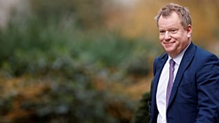 Britain's cabinet minister in charge of relations with the European Union, David Frost, walks outside Downing Street in London