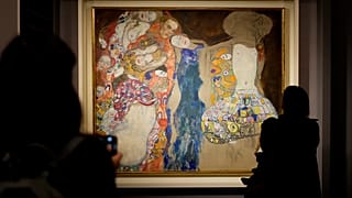 People admire Gustav Klimt's oil on canvas painting "The Bride" (1918) on display at the exhibition "Klimt. The Secession and Italy" at the Museum of Rome