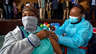 A woman receives her second Pfizer jab east on Johannesburg, South Africa.