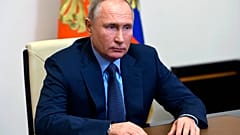 Russian President Vladimir Putin listens to Russian gas monopoly Gazprom Head, Alexei Miller via a video conference.