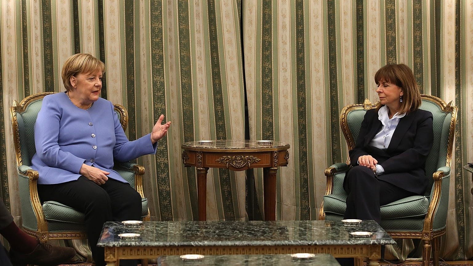 Germany's Chancellor Angela Merkel (left) and Greece's President Katerina Sakellaropoulou.