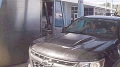 Brian Mark Lemley Jr, driving, and Patrik Mathews, passenger seat, passing through a toll booth near Norfolk, Va., en route to Georgia Sept. 14, 2019.