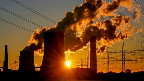 Steam comes out of the chimneys of the coal-fired power station in Niederaussem, Germany, Oct. 24, 2021.