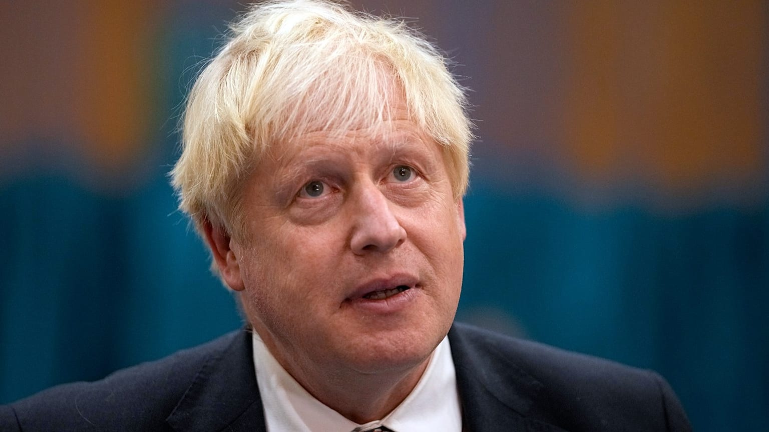 In this Friday, Oct. 22, 2021 file photo, British Prime Minister Boris Johnson visits a COVID-19 vaccination centre in London.