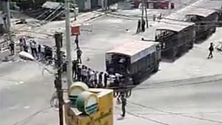 In this image from video obtained by The Associated Press, soldiers line up arrested protesters in Yangon, Myanmar on March 3, 2021. 