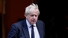FILE: Boris Johnson leaves 10 Downing Street to attend the weekly Prime Minister's Questions at the Houses of Parliament, in London, Wednesday, Oct. 20, 2021.