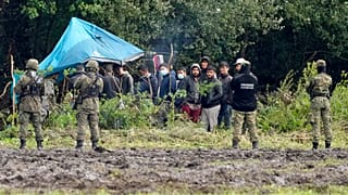 Migrantes en la frontera polaca