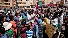 People chant slogans during a protest in Khartoum, Sudan, Saturday, Oct. 30, 2021