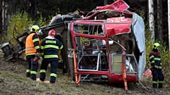 Rescuers work on a scene of a fallen funicular cab under the Mount Jested in Liberec, Czech Republic, on Sunday, Oct. 31, 2021.