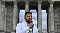Attila Hildmann speaks during a protest against COVID-19 restrictions in May 2020.