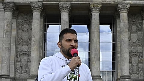 Attila Hildmann speaks during a protest against COVID-19 restrictions in May 2020.