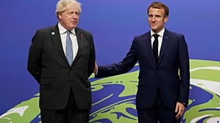 İngiltere Başbakanı Boris Johnson (solda), Fransa Cumhurbaşkanı Emmenuel Macron (sağda)