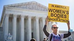 Pro-choice demonstrators are seen outside of the US Supreme Court in Washington, DC on November 1, 2021.
