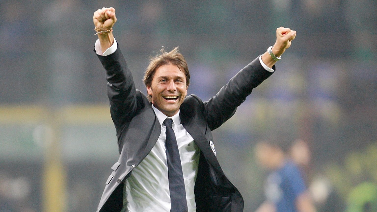 Juventus coach Antonio Conte celebrates during a match with Inter Milan