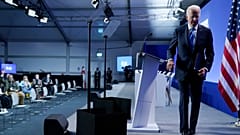 President Joe Biden walks off the stage after speaking during a news conference at the COP26 U.N. Climate Summit, Tuesday, Nov. 2, 2021, in Glasgow, Scotland.