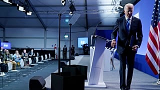 President Joe Biden walks off the stage after speaking during a news conference at the COP26 U.N. Climate Summit, Tuesday, Nov. 2, 2021, in Glasgow, Scotland.