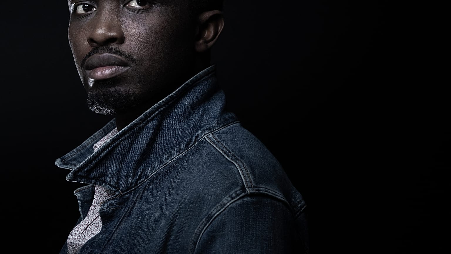 Senegalese writer Mohamed Mbougar Sarr poses during a photo session in Paris on September 17, 2021 