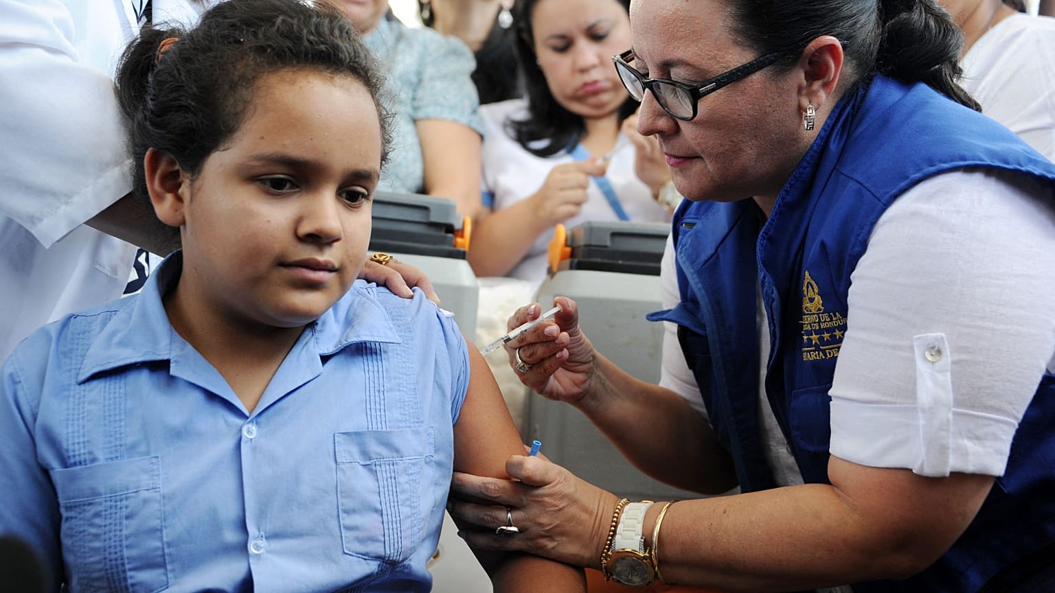 Many children around the world - including this girl in Honduras - are now vaccinated against the cancer-causing human papillomavirus (HPV)