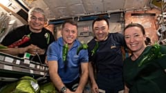 Astronauts in the International Space Station pose with the peppers.