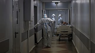 Medical workers in protective gear in a hospital in Krasnodar, southern Russia