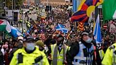 Climate activists attend a protest organised by the Cop26 Coalition in Glasgow, Scotland, Saturday, Nov. 6, 2021