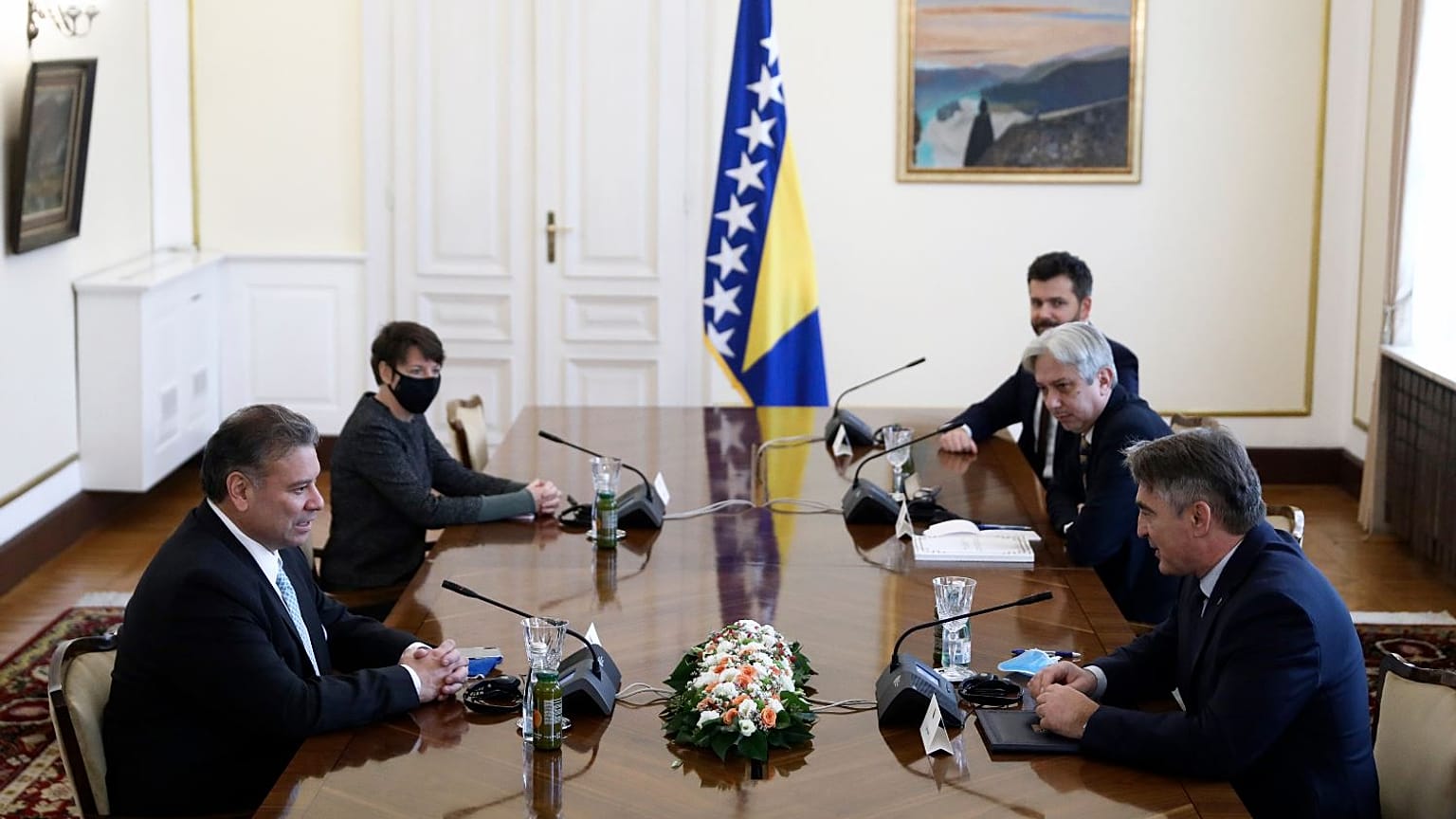 US Deputy Assistant Secretary of State Gabriel Escobar, left, speaks with the Croat member of the Bosnian Presidency Zeljko Komsic.