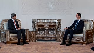 الرئيس السوري بشار الأسد ووزير الخارجية الإماراتي  عبد الله بن زايد آل نهيان