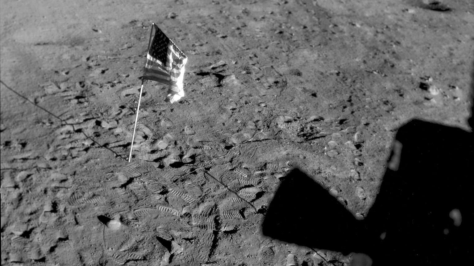 July 21, 1969 photo shows a U.S. flag planted at Tranquility Base on the surface of the moon