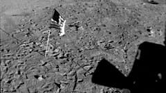 July 21, 1969 photo shows a U.S. flag planted at Tranquility Base on the surface of the moon