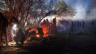 Мигранты на белорусско-польской границе.